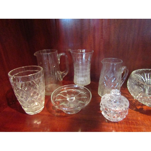 1081 - A quantity of crystal glass vases, jugs, bowls etc.