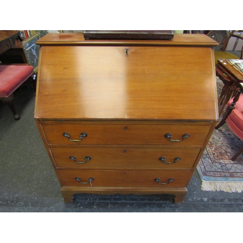 1130 - A 20th Century satin walnut bureau, drop-flap, three long drawers on bracket feet, 102cm tall x 86cm... 