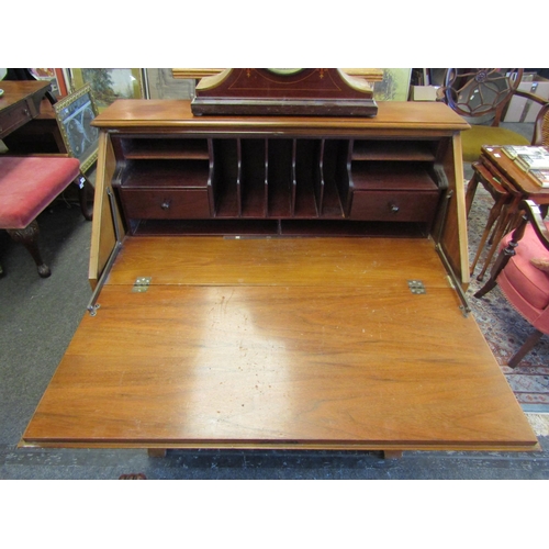 1130 - A 20th Century satin walnut bureau, drop-flap, three long drawers on bracket feet, 102cm tall x 86cm... 