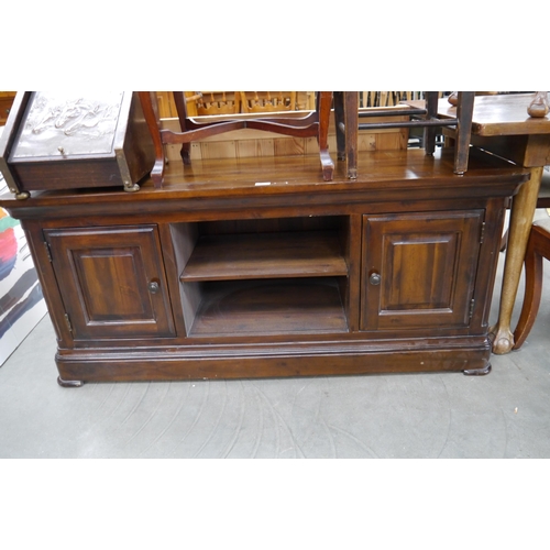 2263 - A stained pine TV stand with two cupboards