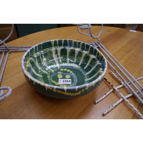 2308 - A green glazed pottery bowl