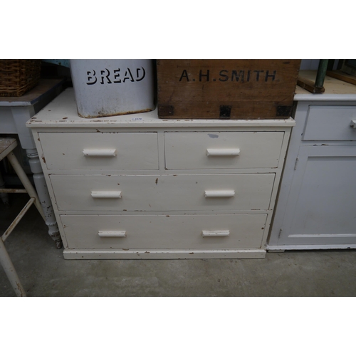 2282 - A Victorian painted pine chest of two over two drawers