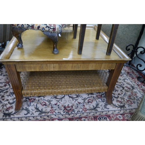 2343 - A square coffee table with rattan under tier