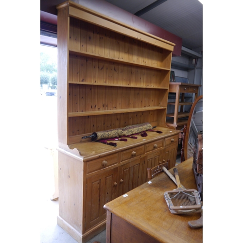 2302 - A large pine kitchen dresser 202 x 220cm