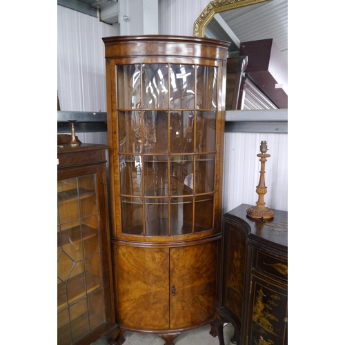 2114 - A 1930's burr walnut & glazed top display cabinet