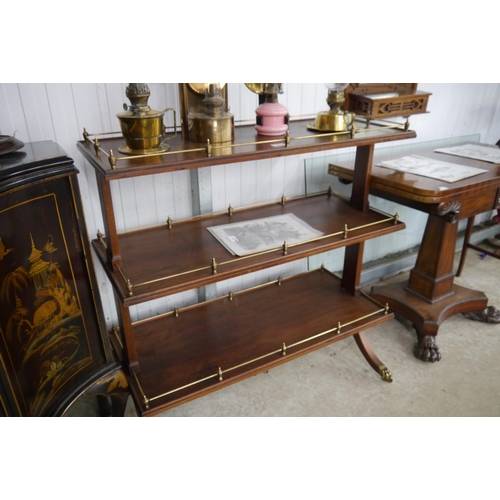 2120 - A Regency style mahogany three tier etagere serving table with brass gallery to each tier on brass c... 