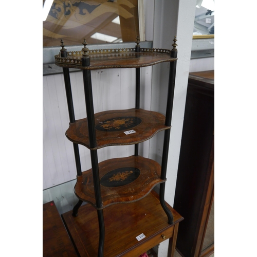 2128 - A 19th Century inlaid three tier stand with brass rail