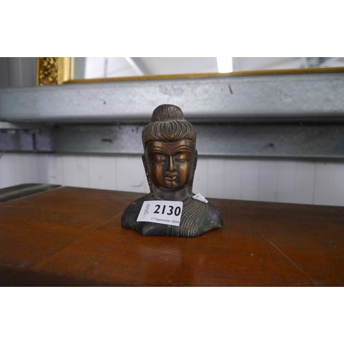 2130 - A small bronze deity head 12cm tall