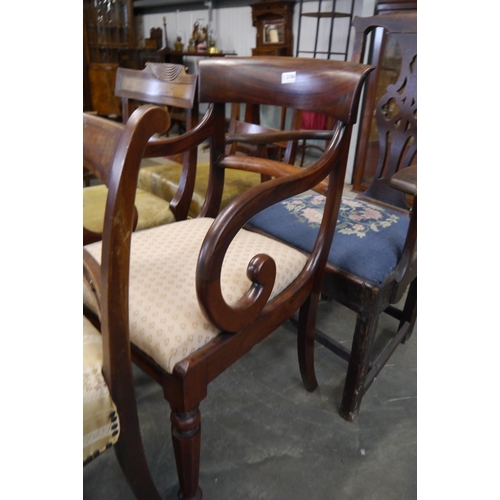 2186 - A Victorian mahogany scroll arm carver chair