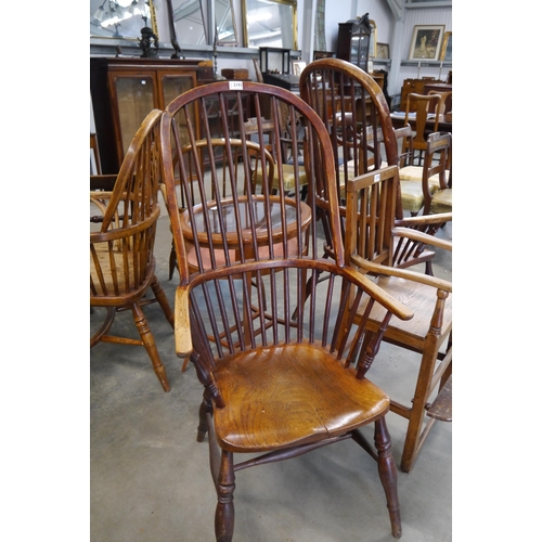 2193 - A pair of 19th Century His and Hers elm seated Windsor chairs