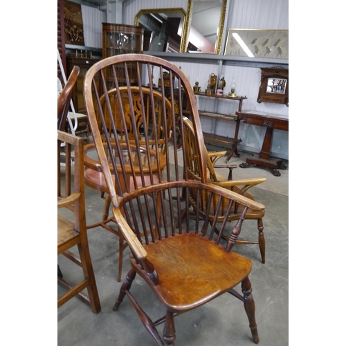 2193 - A pair of 19th Century His and Hers elm seated Windsor chairs