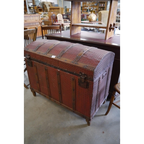 2196 - A 19th century tin and wooden bound trunk