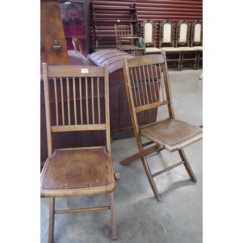 2197 - Two 1930's bentwood folding chairs