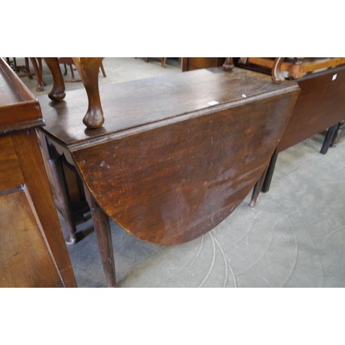 2205 - A 19th Century oak pad foot table