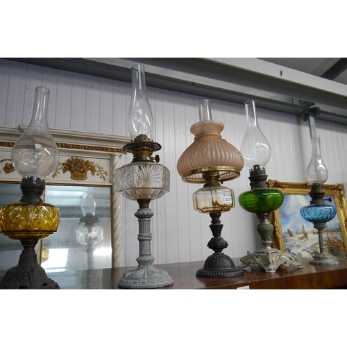 2217 - Five Victorian coloured glass oil lamps