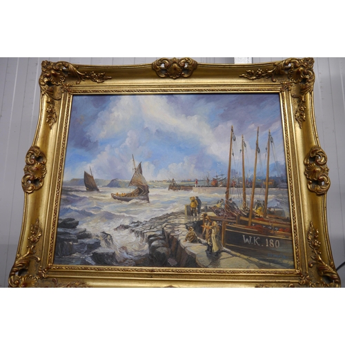 2218 - A gilt framed oleograph of stormy seas on canvas by P.P.Harvey