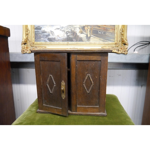 2219 - A 1920's oak smokers cabinet