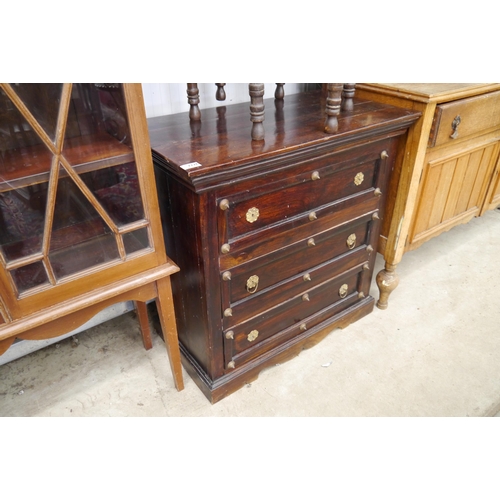 2226 - A mahogany three drawer chest of drawers