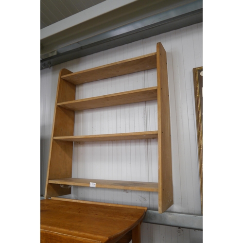 2279 - A light beech four tier bookcase