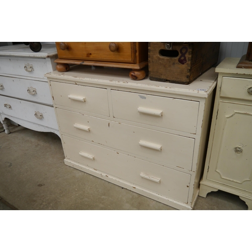 2282 - A Victorian painted pine chest of two over two drawers