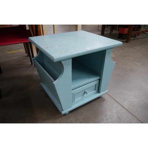 2320 - A painted oak coffee table with magazine rack sides