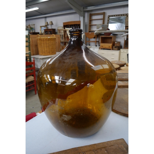 2325 - A large amber glass bottle