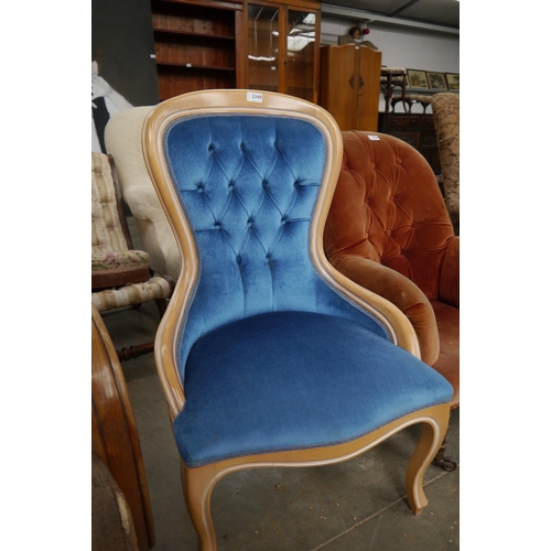 2349 - A Victorian style nursing chair with blue upholstery