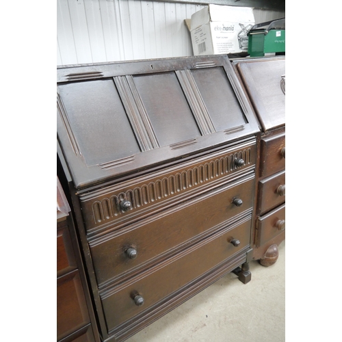 2385 - A 1960's oak bureau and an oak three drawer bureau