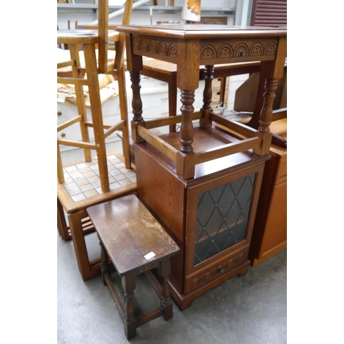 2401 - Two oak stools and a cabinet