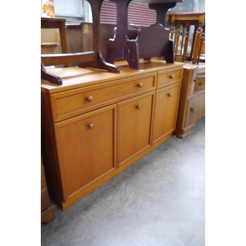 2402 - A teak sideboard