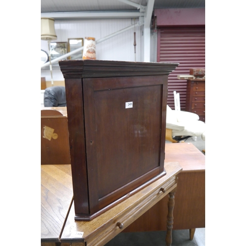 2405 - An Edwardian mahogany corner cabinet