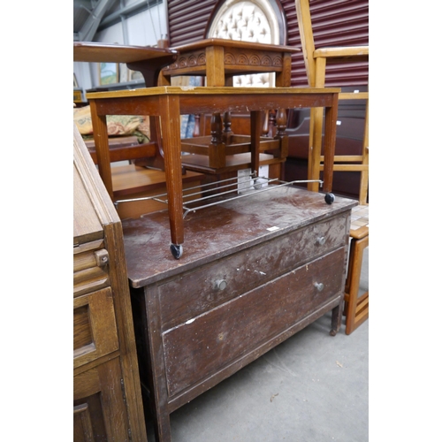 2410 - A 1940's oak two drawer low chest, coffee table and teak nest of three tables