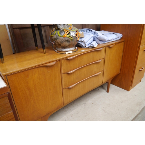 2440 - A teak sideboard