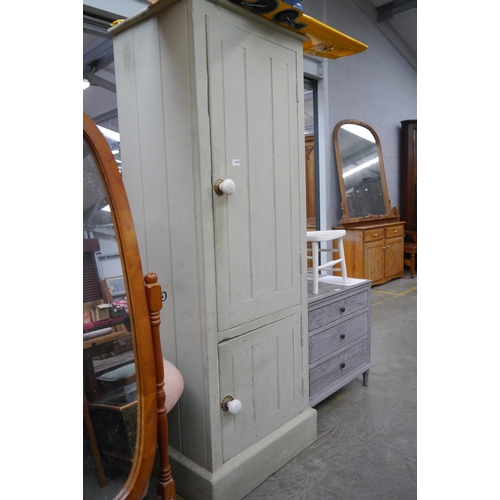 2454 - A heavy pine two door food cupboard