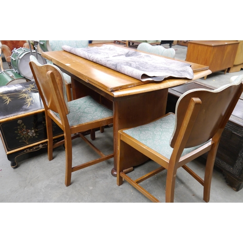 2460 - A 1940's figured walnut draw-leaf table and four cloud back chairs