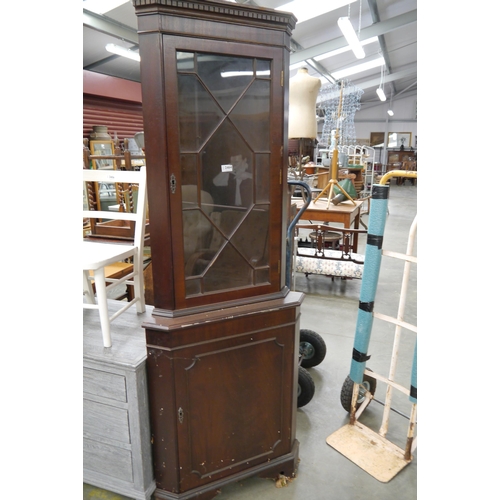 2464 - A mahogany full height corner cabinet