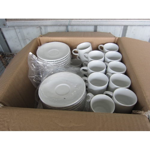 3185 - A box of white ceramic catering espresso cups and saucers