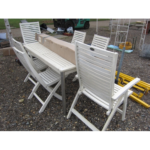 3330 - A hardwood garden table with six chairs and a parasol