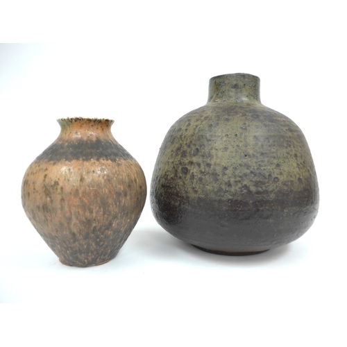 7061 - Two studio pottery vases, largest example with mottled green/grey glaze, incised R.S to base, 21cm h... 