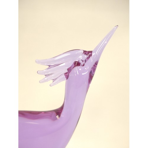 7264 - A Murano hand blown glass figure of a stylised bird on plinth in pale purple. Signature to base, Zan... 