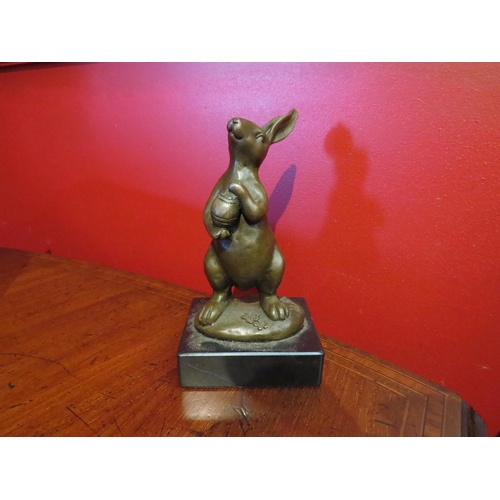 4018 - A small bronze Easter bunny, 14cm tall