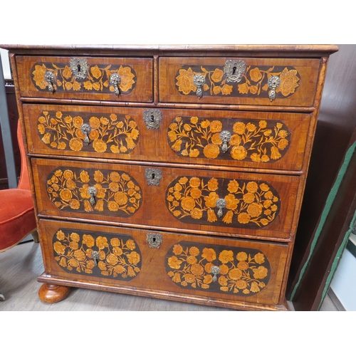 6001 - An 18th Century chest of two short over three graduated long drawers, floral inlay, bun feet with ke... 