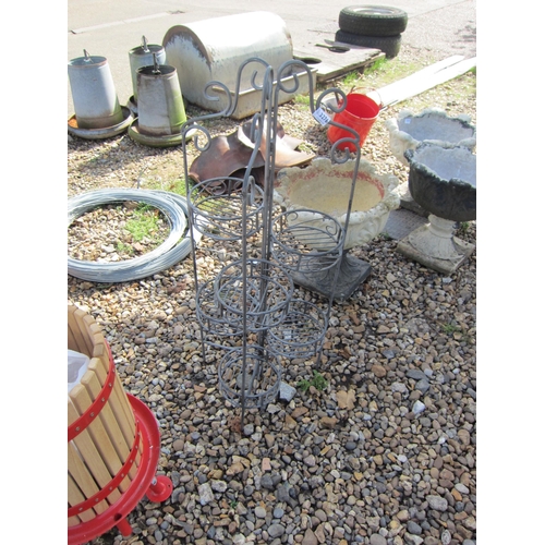 3276 - A wirework six tier plant stand