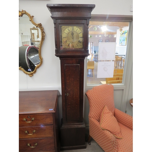 6062 - A late 18th Century oak long case clock, with brass square face and black roman numerals to the chap... 