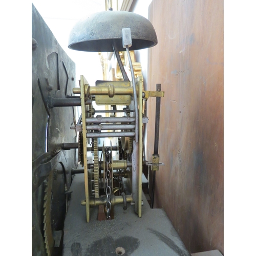 6062 - A late 18th Century oak long case clock, with brass square face and black roman numerals to the chap... 