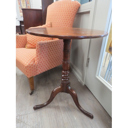 6060 - A George III oak tripod tea table, 51cm diameter