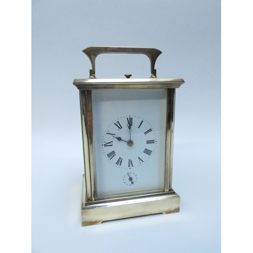 6279 - A French repeater carriage clock, enamel face with Roman numeral dial, two keys