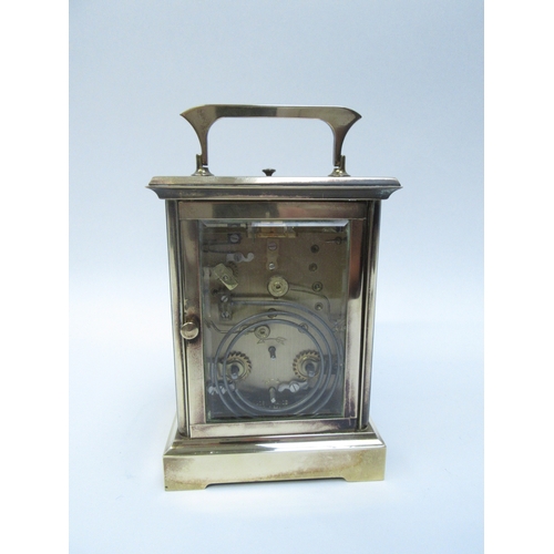 6279 - A French repeater carriage clock, enamel face with Roman numeral dial, two keys