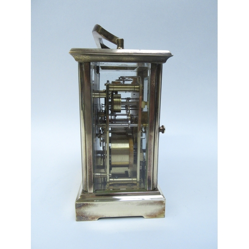 6279 - A French repeater carriage clock, enamel face with Roman numeral dial, two keys