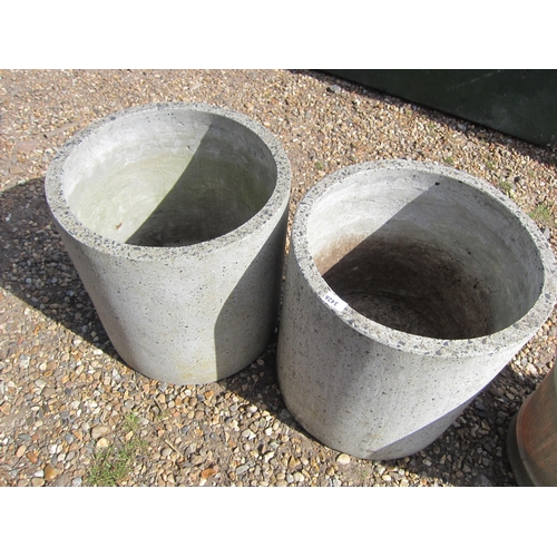 3426 - Two composition circular planters